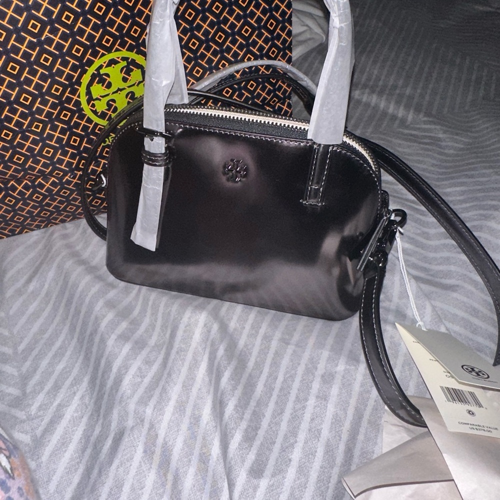 I purchased this bag form the Tory Burch outlet. I have never worn it.